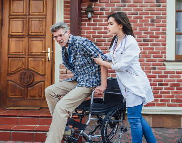 Kome Care carer with client at home in London